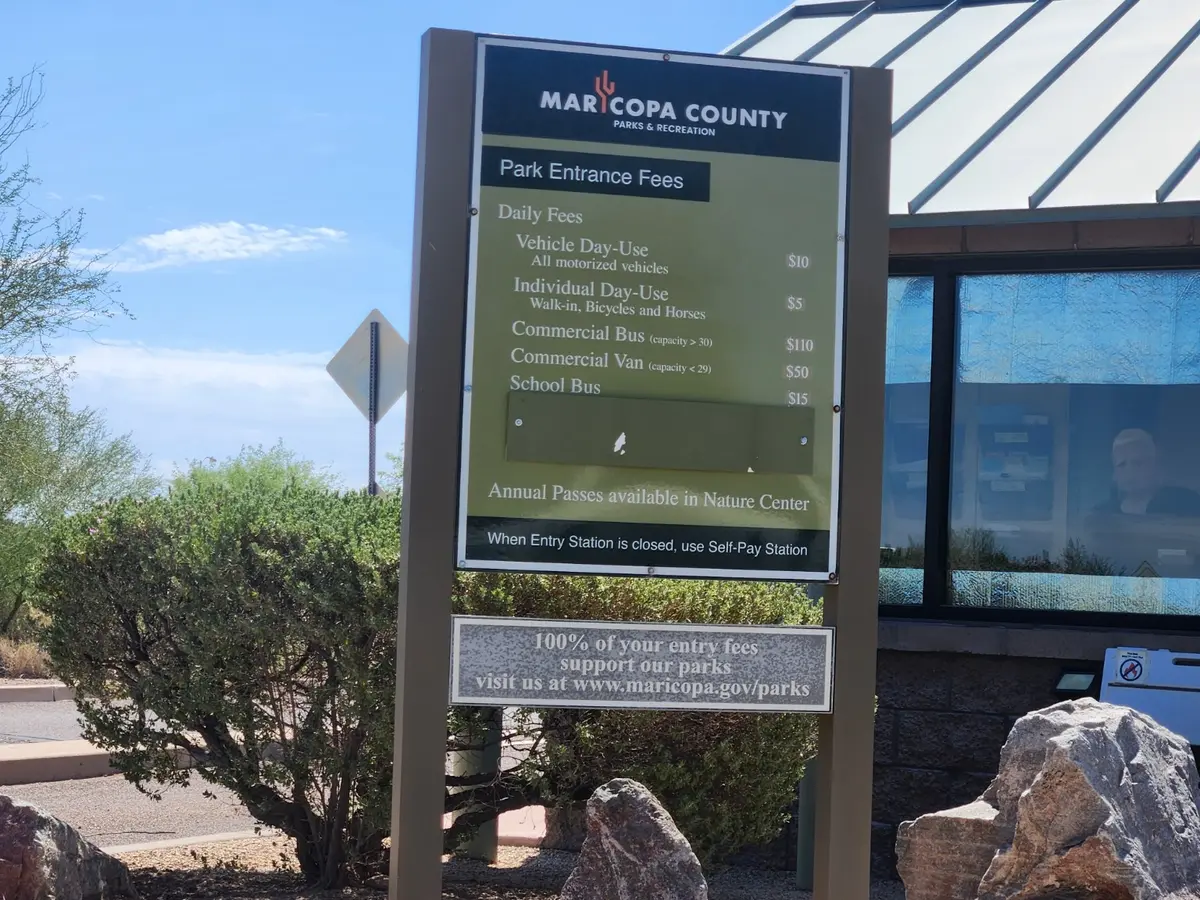 Posted entrance fee board at Estrella Mountain Regional Park