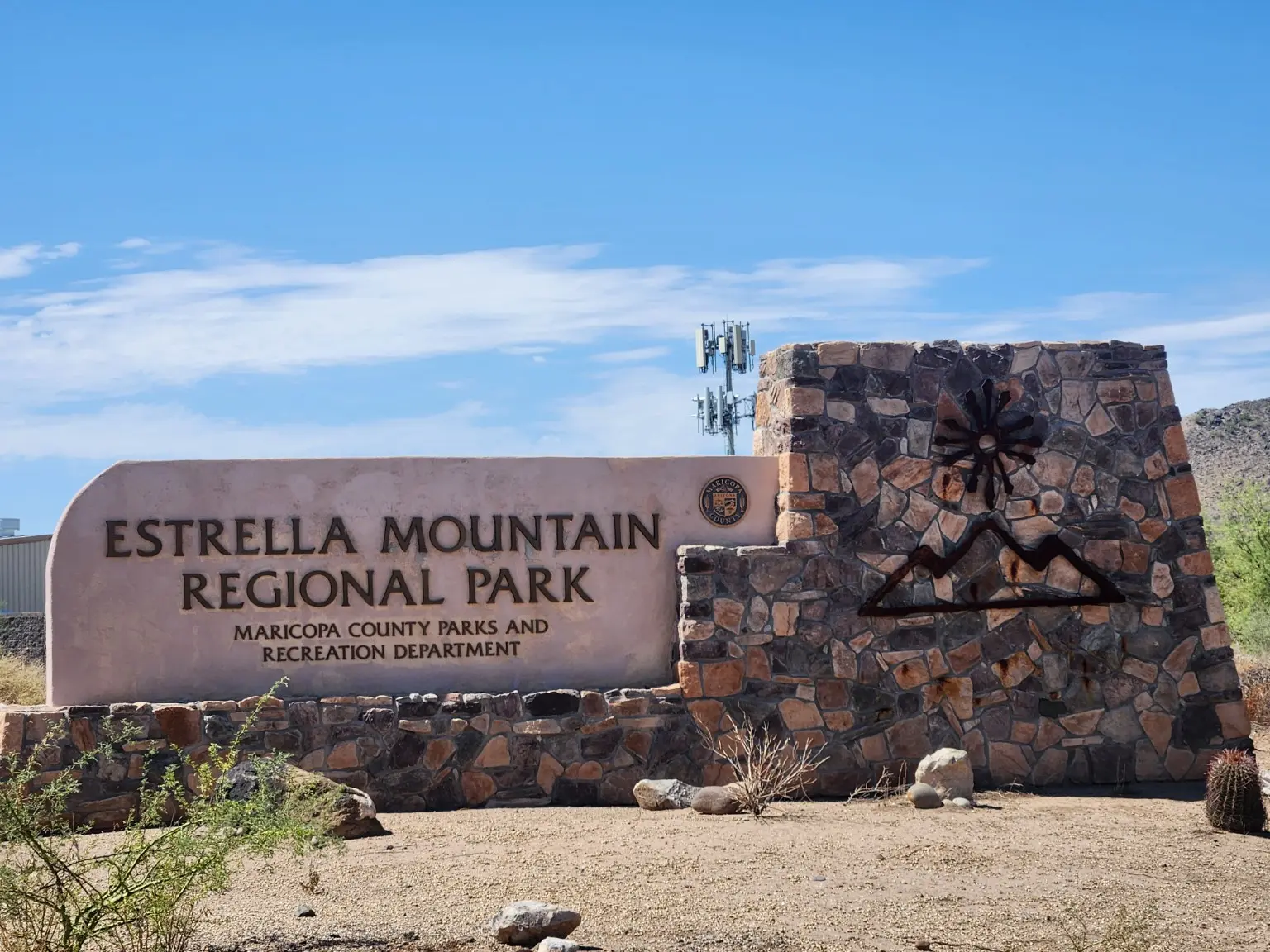 Stone entrance monument at Estrella Mountain Regional Park in Goodyear, Arizona